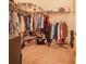 Large walk-in closet with ample hanging space and shelving at 230 Grouper Ct, Poinciana, FL 34759