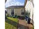 Exterior of the house, showcasing stone accents and a walkway at 4163 Pirates Lndg, Winter Haven, FL 33884