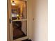 Front door with storm door offering a view into the foyer at 4163 Pirates Lndg, Winter Haven, FL 33884