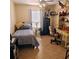 Bedroom with twin bed, desk, and built-in safe at 4163 Pirates Lndg, Winter Haven, FL 33884