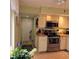 Kitchen entry with view into adjacent living area at 4163 Pirates Lndg, Winter Haven, FL 33884
