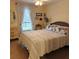 Bright bedroom with a queen-size bed and decorative pillows at 4163 Pirates Lndg, Winter Haven, FL 33884