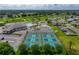 Aerial view of community amenities including pool and pickleball courts at 5838 Macaw Pl, Lakeland, FL 33809