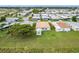 Aerial view of a mobile home with a spacious backyard and shed at 6762 Brentwood Ne Dr, Winter Haven, FL 33881