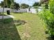 Simple backyard with a white fence at 123 Osprey Heights Dr, Winter Haven, FL 33880