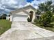 House exterior with driveway and landscaping at 123 Osprey Heights Dr, Winter Haven, FL 33880