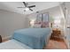 Serene bedroom with a tranquil color scheme and stylish decor at 1324 Mirror Nw Ter, Winter Haven, FL 33881