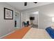 Bedroom with view of living room and fireplace at 1324 Mirror Nw Ter, Winter Haven, FL 33881