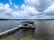 Private boat dock with covered area at 1324 Mirror Nw Ter, Winter Haven, FL 33881