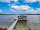 Private boat dock with covered area at 1324 Mirror Nw Ter, Winter Haven, FL 33881