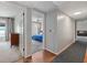 Hallway with carpet and doors leading to bedrooms at 1324 Mirror Nw Ter, Winter Haven, FL 33881