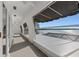 Long deck overlooking the lake with screened enclosure at 1324 Mirror Nw Ter, Winter Haven, FL 33881