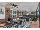 Covered patio with dining and seating areas at 1324 Mirror Nw Ter, Winter Haven, FL 33881