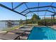 Enjoy the amazing lake view from the pool at 1324 Mirror Nw Ter, Winter Haven, FL 33881