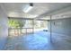 Covered carport with concrete flooring and street view at 149 Avenue E Sw, Winter Haven, FL 33880
