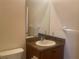 Small bathroom with vanity and toilet at 1561 Vienna Square Dr, Winter Haven, FL 33884