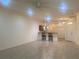 Bright and spacious living room with tile flooring and access to a patio at 1561 Vienna Square Dr, Winter Haven, FL 33884