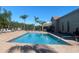 Inviting community pool with ample deck space for lounging at 1561 Vienna Square Dr, Winter Haven, FL 33884