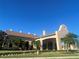 Elegant community center building with landscaping at 1561 Vienna Square Dr, Winter Haven, FL 33884