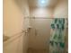 Clean bathroom with shower/tub combo and grab bars at 1561 Vienna Square Dr, Winter Haven, FL 33884