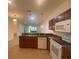 Well-equipped kitchen featuring modern appliances and ample counter space at 1561 Vienna Square Dr, Winter Haven, FL 33884