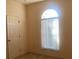 Bedroom with window, closet, and ceiling fan at 1561 Vienna Square Dr, Winter Haven, FL 33884