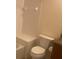 Clean bathroom with toilet and tub at 1561 Vienna Square Dr, Winter Haven, FL 33884