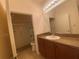 Bathroom with vanity, toilet, shower, and tub at 1561 Vienna Square Dr, Winter Haven, FL 33884
