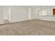 Spacious living room with neutral decor and carpet flooring at 1613 Linz Ct, Winter Haven, FL 33884