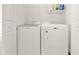 Laundry room with side-by-side washer and dryer at 1613 Linz Ct, Winter Haven, FL 33884