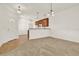 Open dining room with kitchen access and carpet flooring at 1613 Linz Ct, Winter Haven, FL 33884
