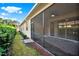 Screened porch with paver patio and access to backyard at 1613 Linz Ct, Winter Haven, FL 33884