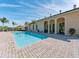 Inviting community pool with brick pavers at 1613 Linz Ct, Winter Haven, FL 33884