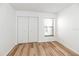 Light and airy bedroom with double-door closet at 1807 Garden Lake Dr # 1807, Winter Haven, FL 33884