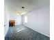 Spacious bedroom with light purple walls and ceiling fan at 221 Dorothy St, Auburndale, FL 33823