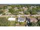 Aerial view of a house in a residential neighborhood at 221 Dorothy St, Auburndale, FL 33823