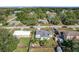 Single Gathering home with a fenced backyard and shed at 221 Dorothy St, Auburndale, FL 33823