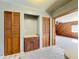 Small kitchen nook with wood cabinets and built-in shelving at 221 Dorothy St, Auburndale, FL 33823