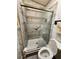 Updated bathroom with a large walk-in shower and modern fixtures at 312 Douglas Park Ave, Davenport, FL 33897