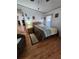 Relaxing bedroom with a comfortable bed and ample natural light at 312 Douglas Park Ave, Davenport, FL 33897