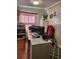 Bright home office with a large desk, computer, and printer at 312 Douglas Park Ave, Davenport, FL 33897