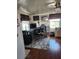 Home office features a large desk, comfortable chair, and ample storage at 312 Douglas Park Ave, Davenport, FL 33897