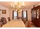 Formal dining room with chandelier and a china cabinet at 364 Fish Hawk Dr, Winter Haven, FL 33884