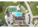 Aerial view showing community amenities including pool, tennis courts, and clubhouse at 3754 Wildcat Run, Lakeland, FL 33810