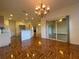 Bright dining area with hardwood floors and kitchen access at 4152 Aberdeen Ln, Lake Wales, FL 33859