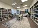 Community library with ample bookshelves and seating at 4152 Aberdeen Ln, Lake Wales, FL 33859