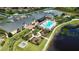 Community clubhouse with pool, landscaping, and chessboard design at 4152 Aberdeen Ln, Lake Wales, FL 33859