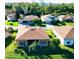 Aerial view of single-Gathering home with brown roof and landscaped yard at 4152 Aberdeen Ln, Lake Wales, FL 33859
