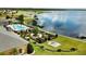 Landscaped area with pool, chessboard, and community clubhouse at 4152 Aberdeen Ln, Lake Wales, FL 33859