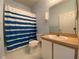 Clean bathroom with shower, toilet and vanity at 4152 Aberdeen Ln, Lake Wales, FL 33859